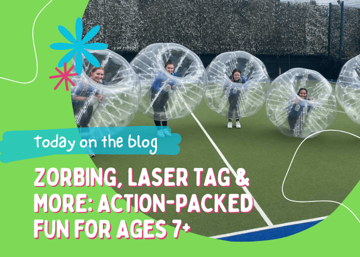 Children playing laser tag and zorbing outdoors at a summer holiday camp